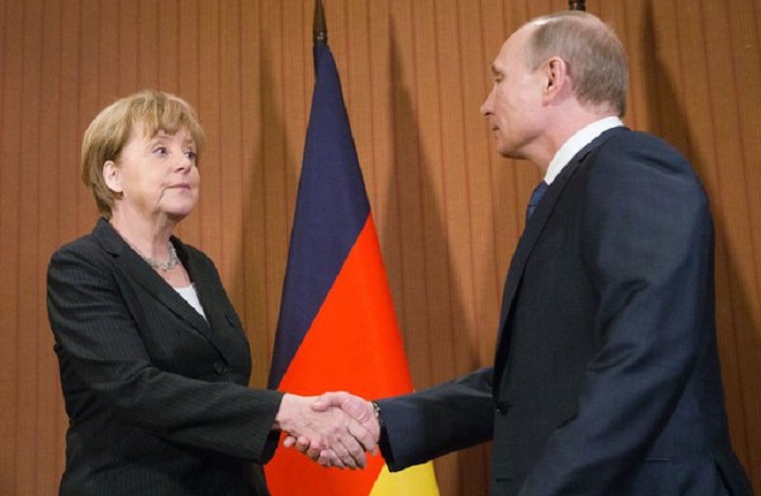 In Talks With Merkel, Putin Calls for Improving Relations With Europe